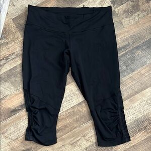 Lululemon Black Capri Leggings with mesh and ruching detail
